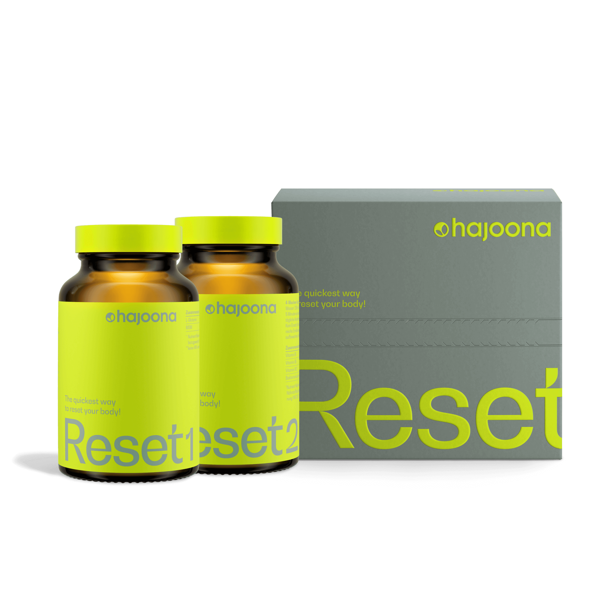 Zwei braune Flaschen mit gelbem Etikett und gelbem Deckel stehen vor einer grauen Kartonverpackung mit gelber Aufschrift „Reset“. Das Design wirkt modern und hochwertig.
